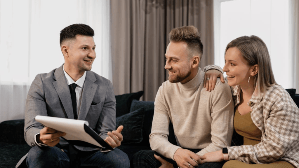 Consultant showing chatbot demo to small business owner in cafe